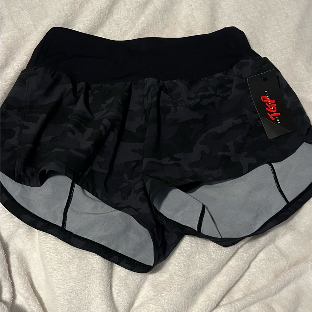 Brand new camo shorts - size large